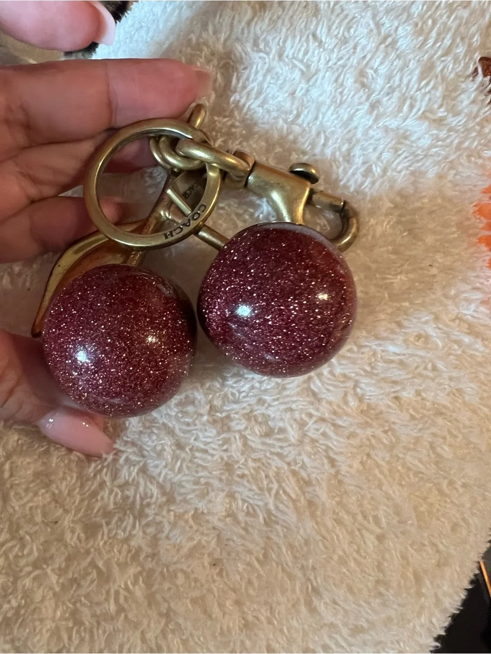 Coach Glitter Cherry Keyring in Burgundy with Gold Hardware